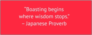 red box with white text: “Boasting begins where wisdom stops.” – Japanese Proverb
